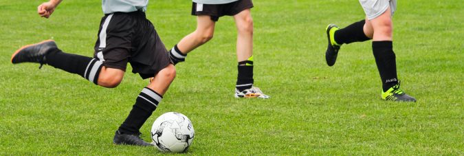 kids playing football