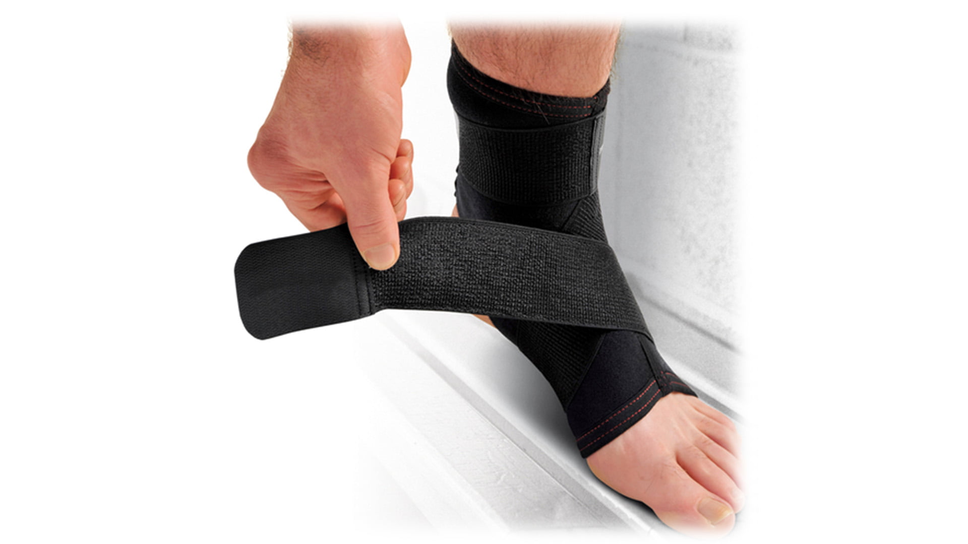 Neoprene Ankle with Strap Support Mark Harrod Ltd.